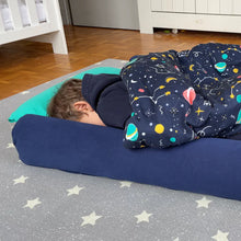 Load image into Gallery viewer, Boy sleeping on Toddler Bundle Bed Camping and Sleepover Bed, in Space Design. The best camping and sleepover toddler bed