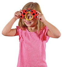 Load image into Gallery viewer, Girl looking through Ladybird Magnifier, children's magnifying toy for camping