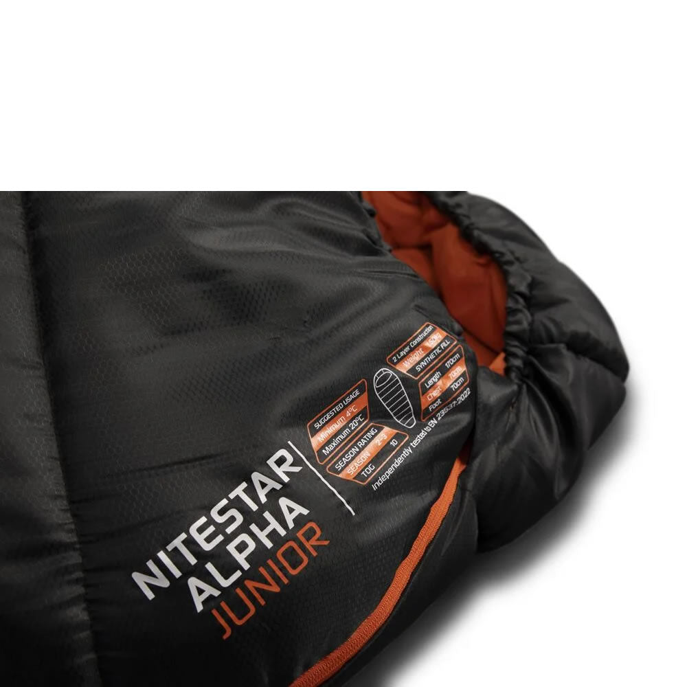 A Close-up of the opening of the Vango Nitestar Alpha Junior in Pirate Black showing technical details printed on the bag