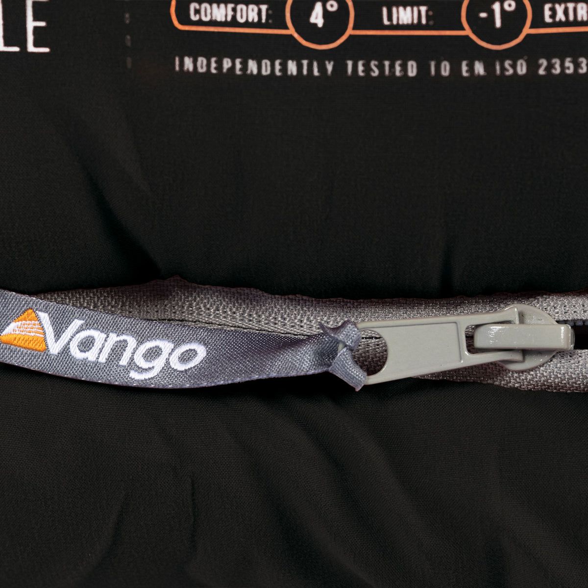 Close-up of a Vango branded product with a zipper on a black background