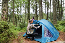 Load image into Gallery viewer, A Mum opening up a Vango Alpha 400 CLR 4 Person Family Tent 
