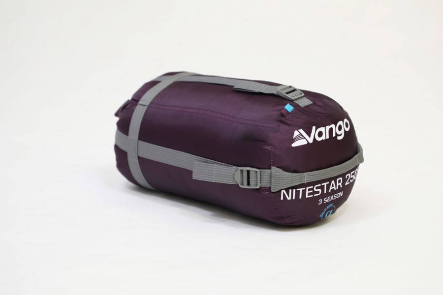 Vango Nitestar 250S (short) childrens sleeping bag in pheonix purple in bag at an angle