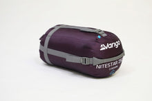 Load image into Gallery viewer, Vango Nitestar 250S (short) childrens sleeping bag in pheonix purple in bag at an angle
