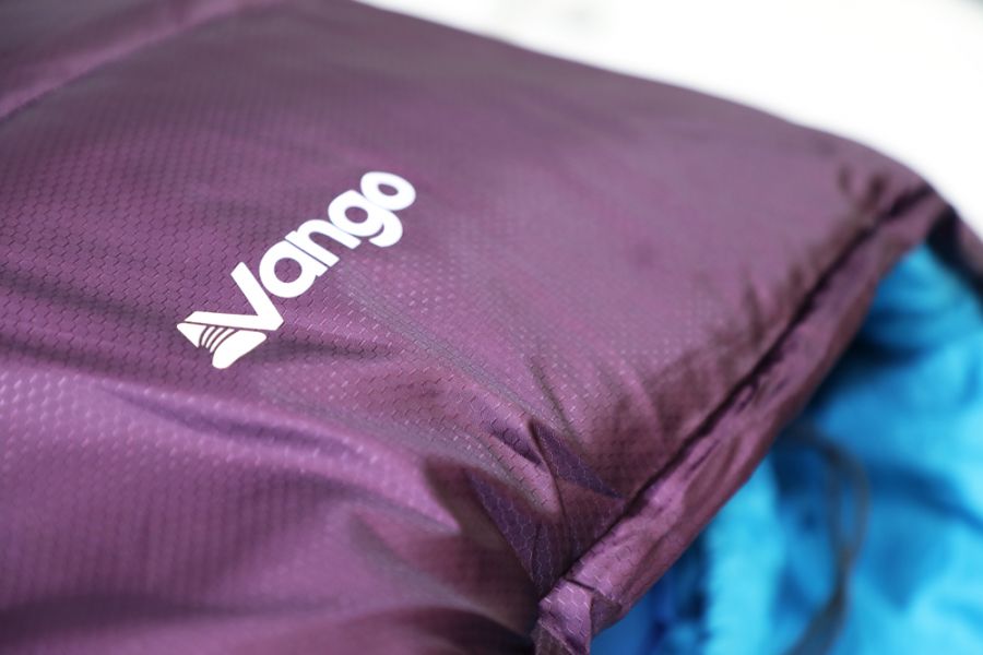 Close up of logo on Vango Nitestar 250S (short) childrens sleeping bag in pheonix purple