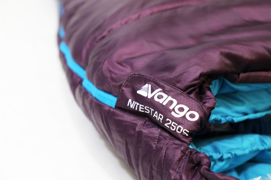 Vango Nitestar 250S (short) childrens sleeping bag in pheonix purple zip cover