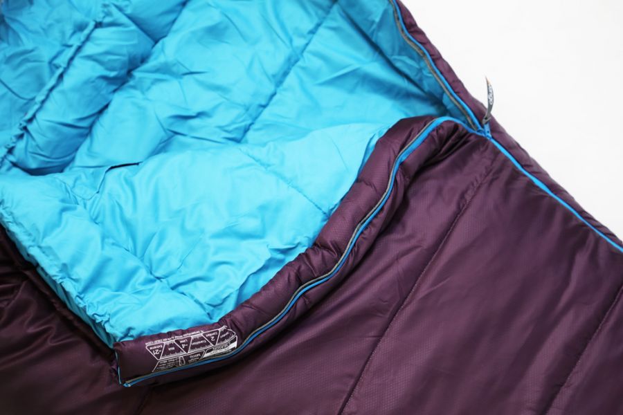 Vango Nitestar 250S (short) childrens sleeping bag in pheonix purple laid open with tech info on display