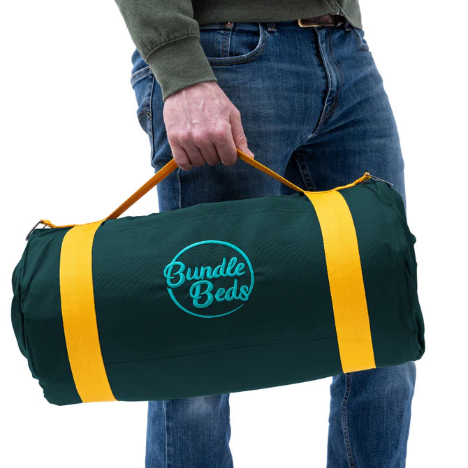 Junior Bundle Bed Camping and Sleepover Bed, in Adventure Design. The best camping and sleepover kids bed, Shown rolled up being carried.