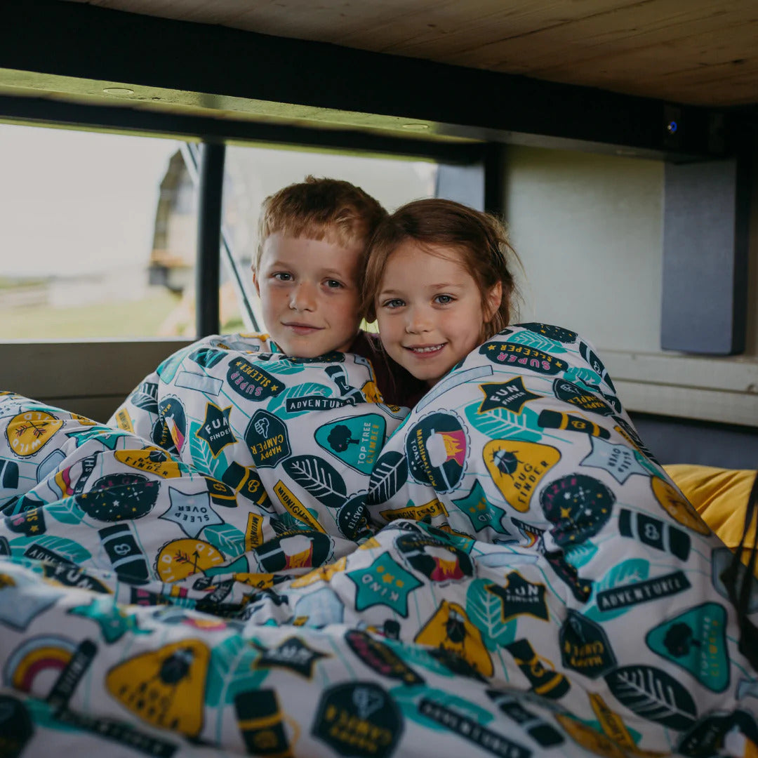 Two kids in a Motorhome or Caravan in their Junior Bundle Bed Camping and Sleepover Bed