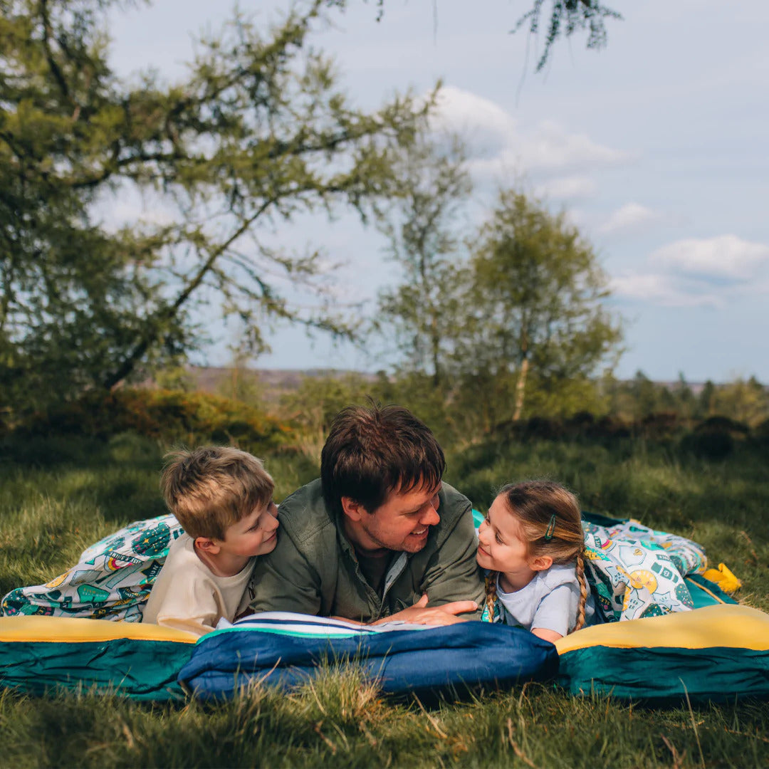 Two kids and their Dad camping in their Junior Bundle Bed Camping and Sleepover Bed