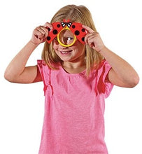 Load image into Gallery viewer, Girl looking through Ladybird Magnifier, children&#39;s magnifying toy for camping
