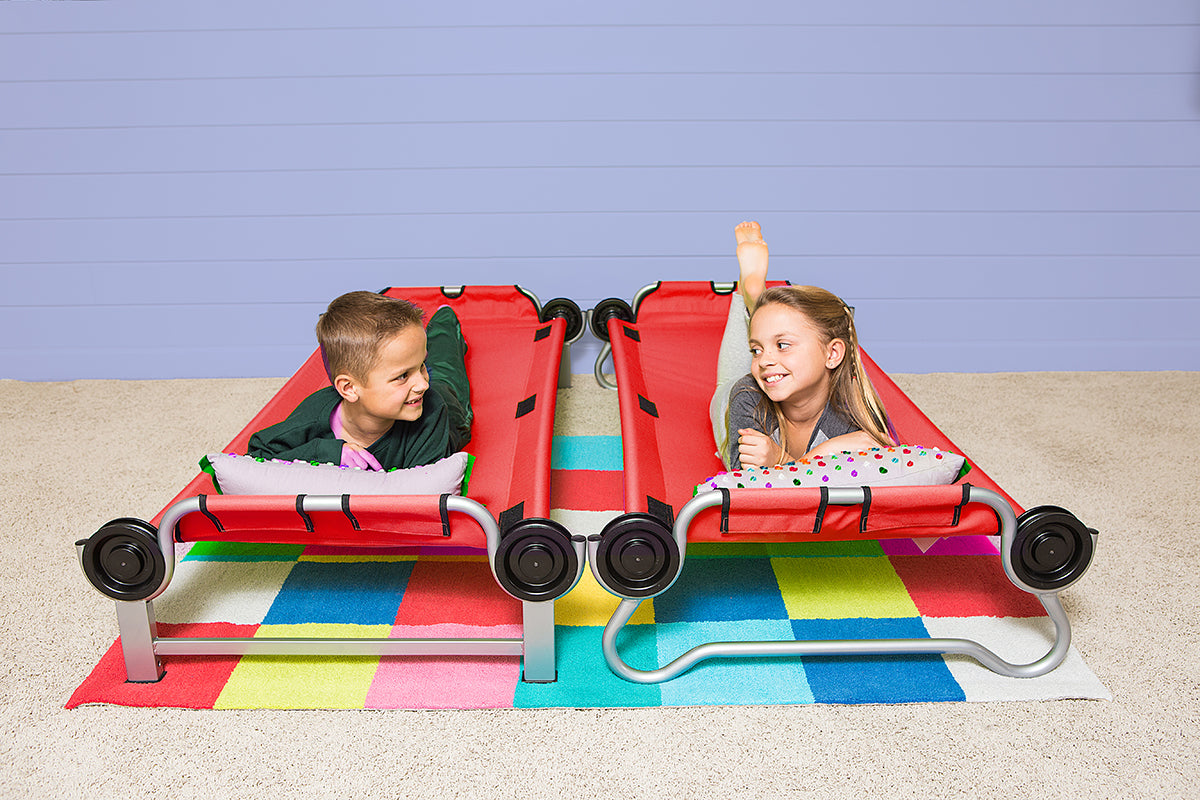 Red Kid O Bunk Childrens Camping Bunk Beds, shown with two children on single beds