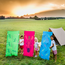 Load image into Gallery viewer, Urban Safari Luxury Kids Camp Bed - held by 3 children in a field
