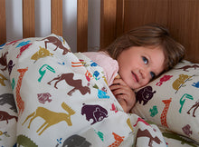 Load image into Gallery viewer, Girl in Dinky Duvalay, Childrens Luxury Camping Bed, at Kids Camping Store
