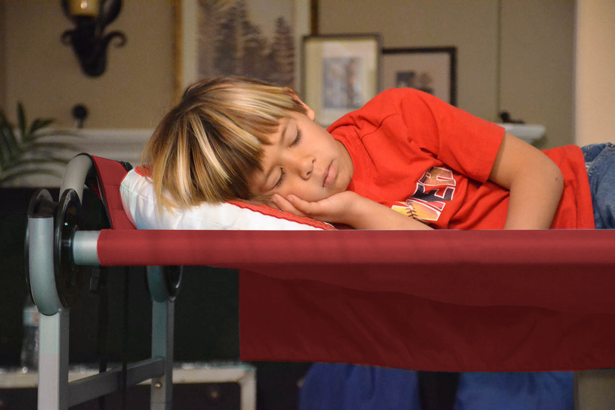 Kid asleep on Red Kid O Bunk Childrens Camping Bunk Beds