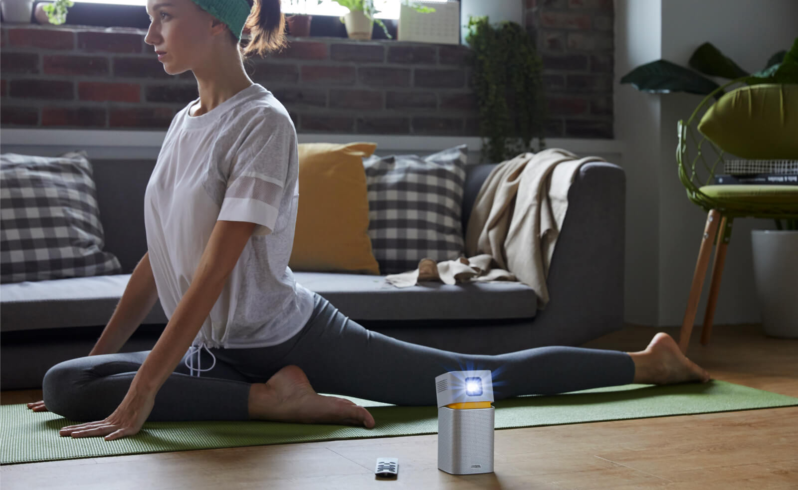 Benq GV1 Portable Camping Projector whilst doing yoga